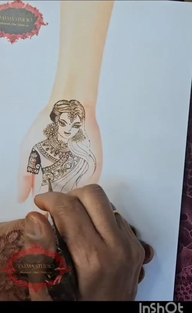 Detailed henna portrait figure drawn on a hand